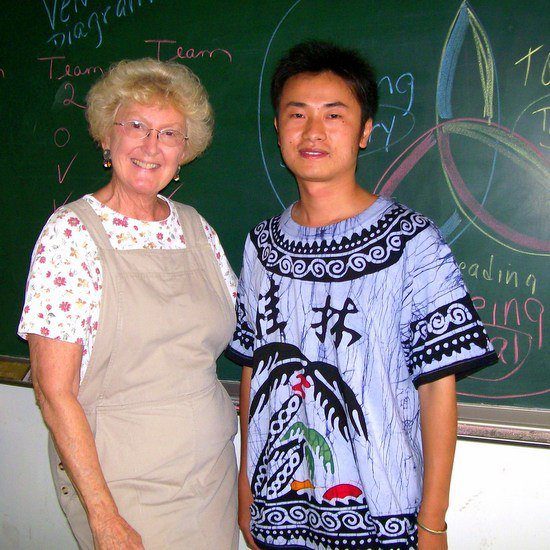 Marilyn with one of her students while teaching in China. Marilyn with one of her students while teaching in China.