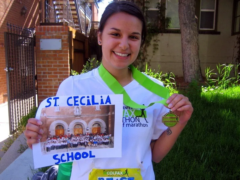 Finishing a half-marathon, dedicated to her students.