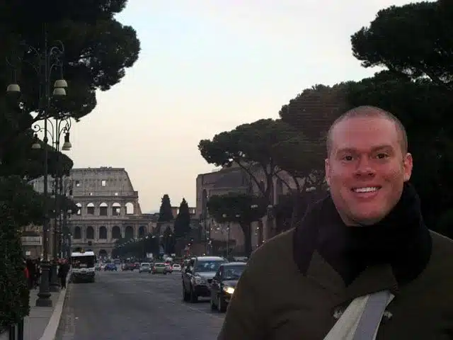 In Rome, Italy with the famous Colosseum behind.