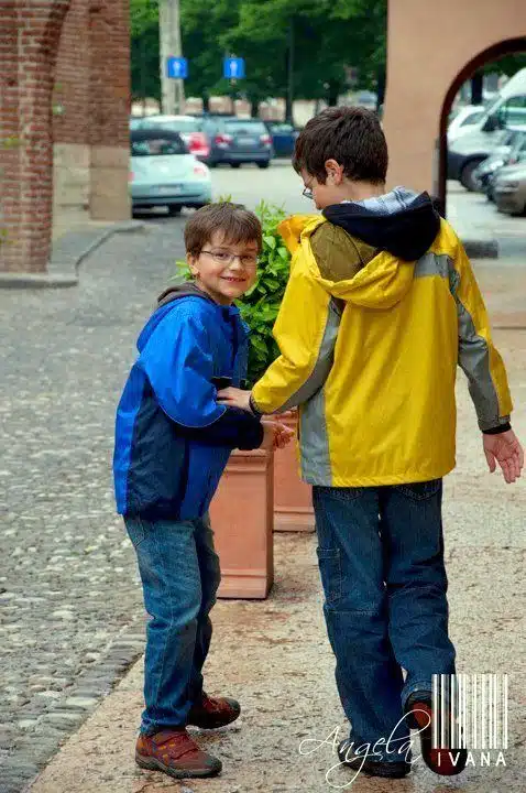 Italian boys giggle after seeing the blow-up doll.