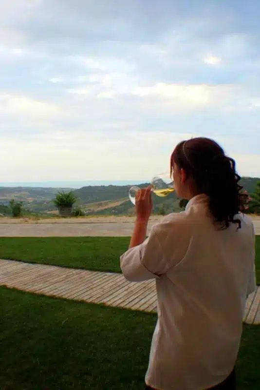 Sipping wine at the source at La Caniette Vineyard.