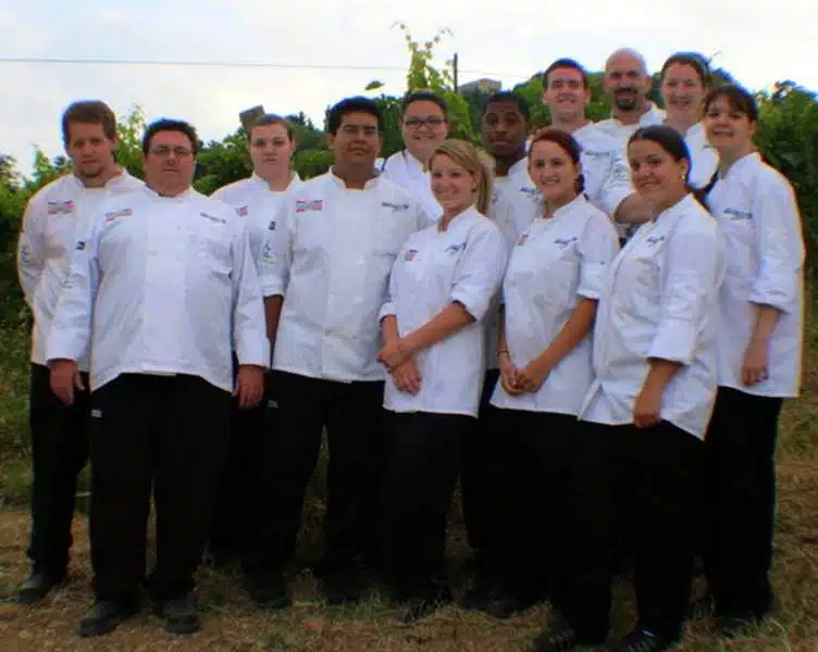 "Team Italia" before starting dinner prep at Le Caniette. James is "the bald guy in back!"