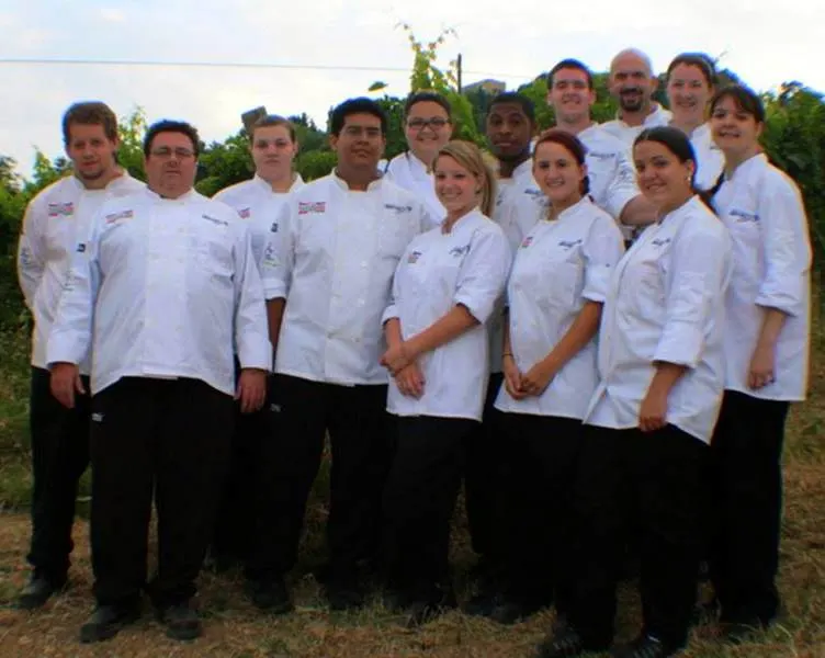 "Team Italia" before starting dinner prep at Le Caniette. James is "the bald guy in back!"