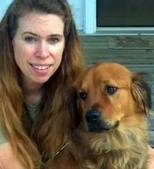 Kate and a beloved dog.