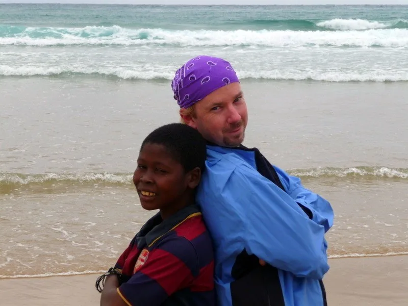 With a local friend by the Indian Ocean in Mozambique.