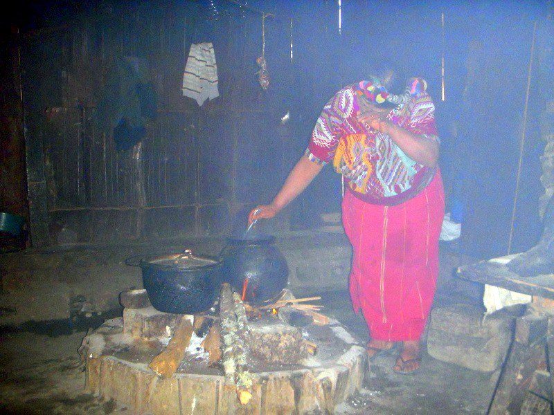 A theatre scene showing the pain of smoky stoves.