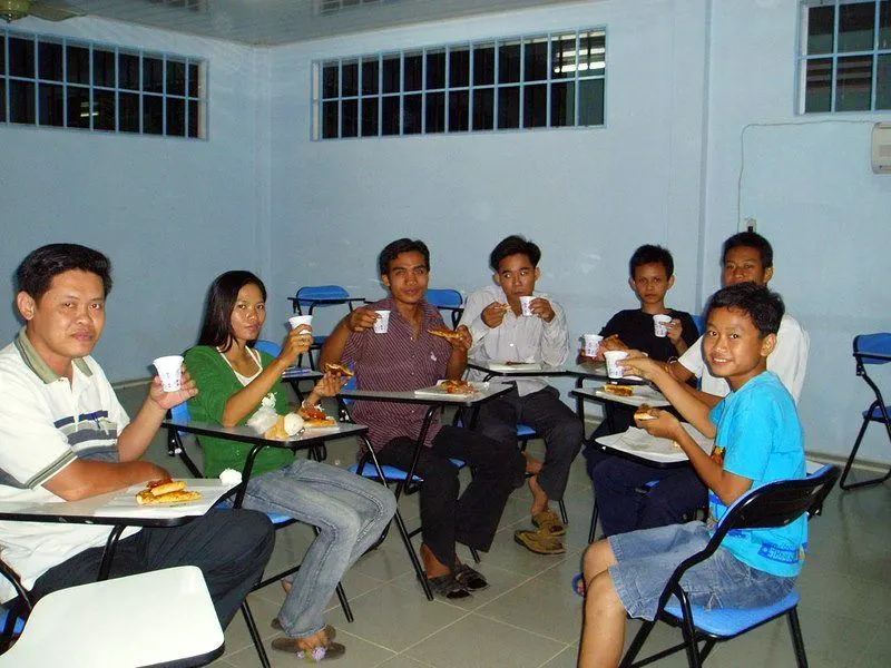 A class pizza party in Cambodia to coincide with a lesson about pizza in May 2006. For some of Nikki's students, this was the first time eating pizza.