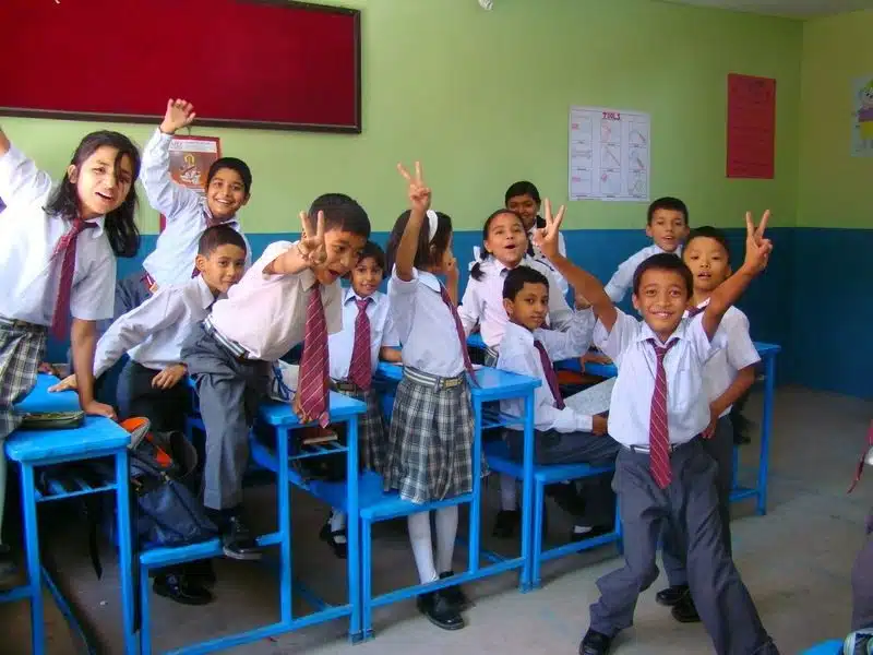 Jacob's Class IV students, very excited to be on camera.