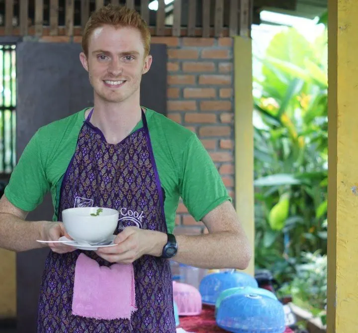 Samuel cooking during his exotic travels.