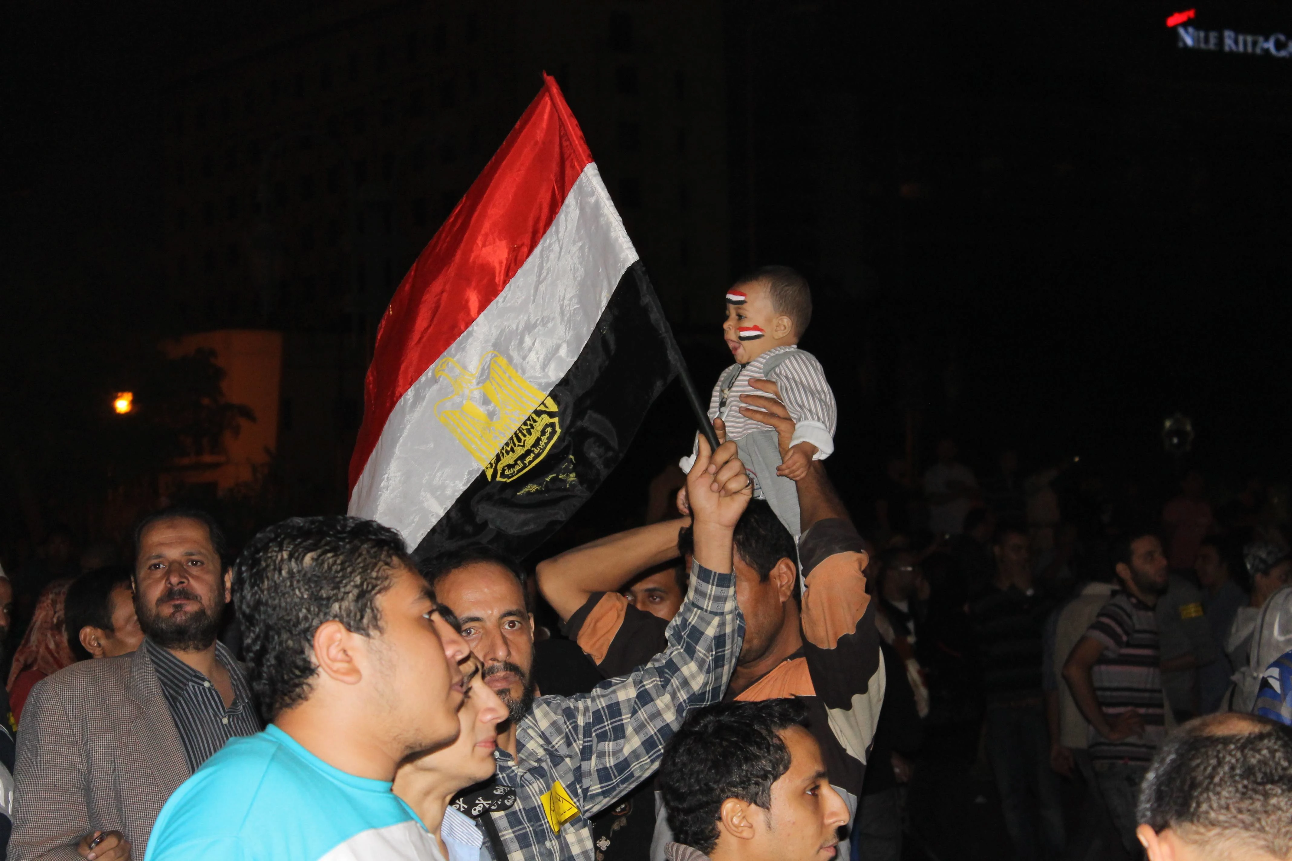 Demonstrators at Essam Atta's funeral in Cairo, Egypt.