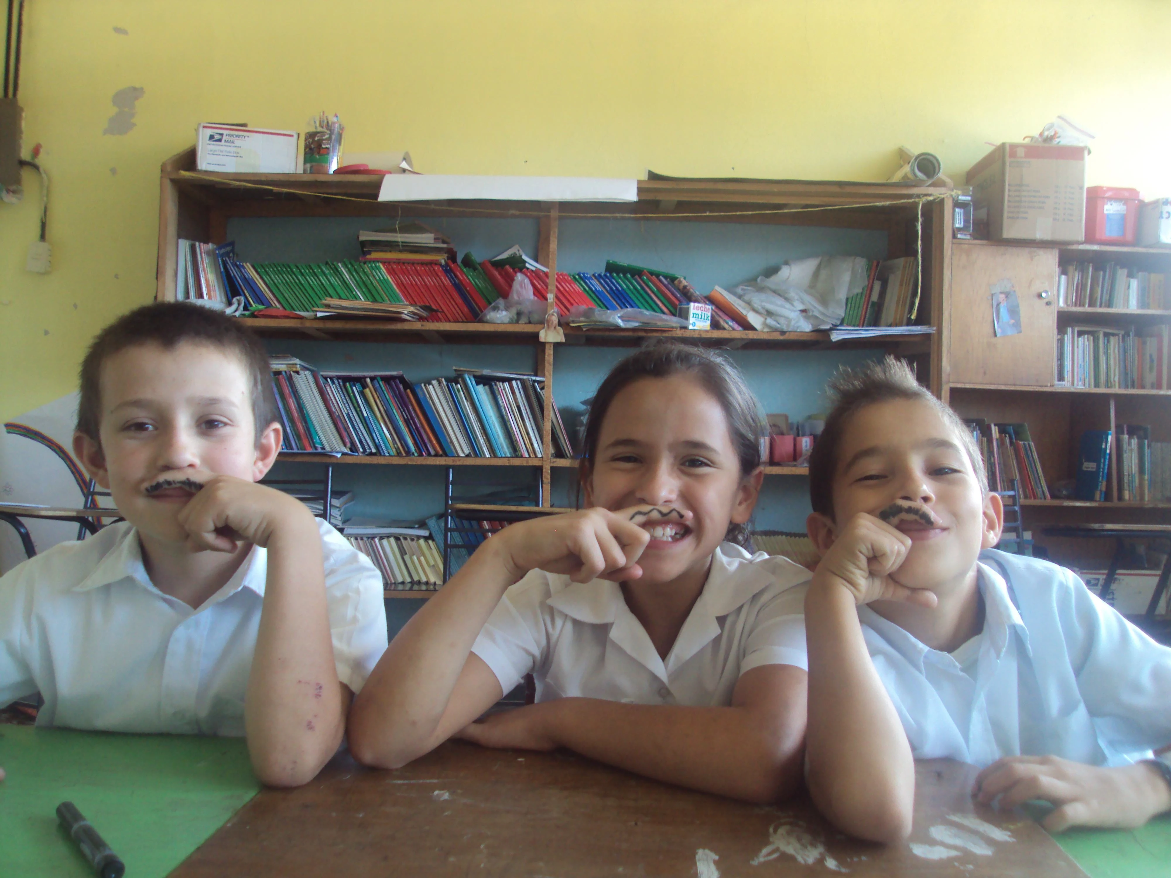  "I have a mustache!" 4th grade students learning to describe people.