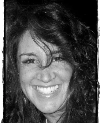 Gretchen, smiling through Iraq teaching intensity.