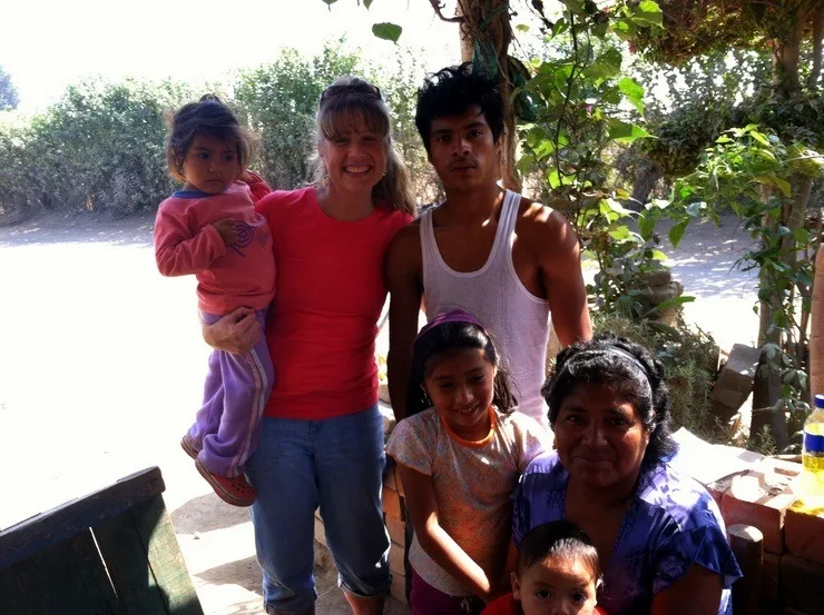 Teacher Kitty making new friends during her Peru travels.