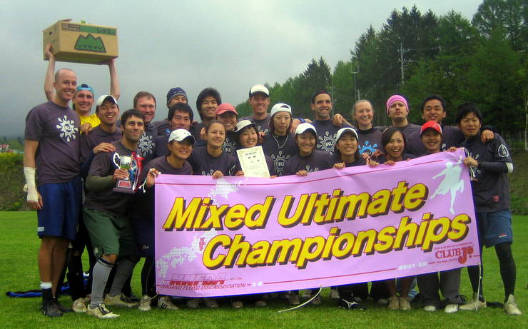 2010 Japan Mixed Nationals Champions. (The box raised high contains the prize: lettuce!)