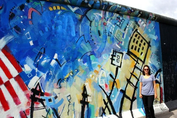 Sarah at the Berlin Wall East Side Gallery.