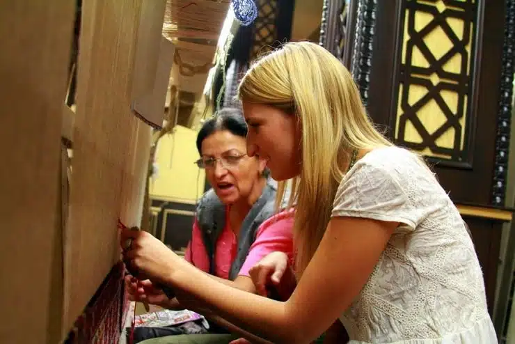 Learning how to weave carpets in Azerbaijan.