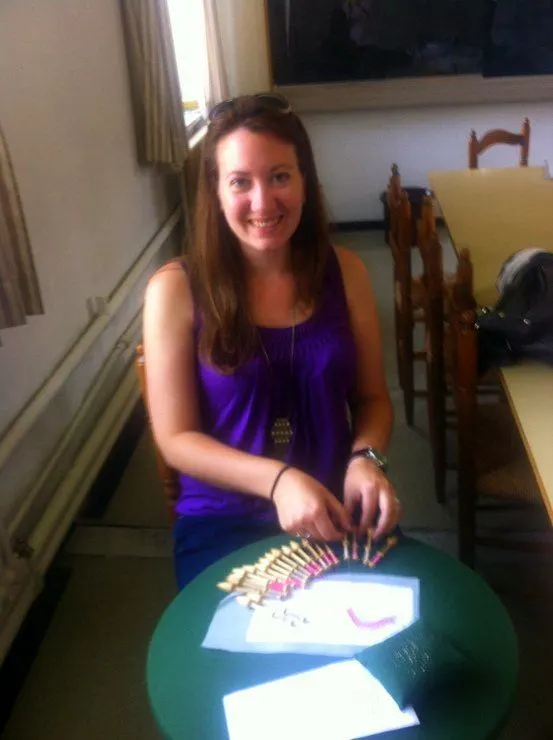 Katie making a piece of lace in the classroom in Bruges.