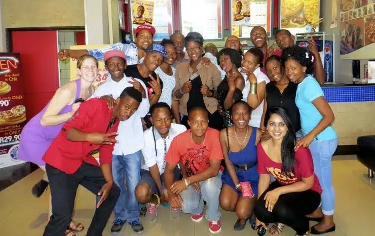 Mica with Club Empower students at their end of the year pizza party.