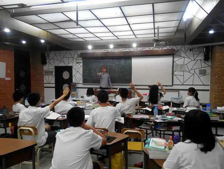 Eric in one of his many teaching jobs abroad.