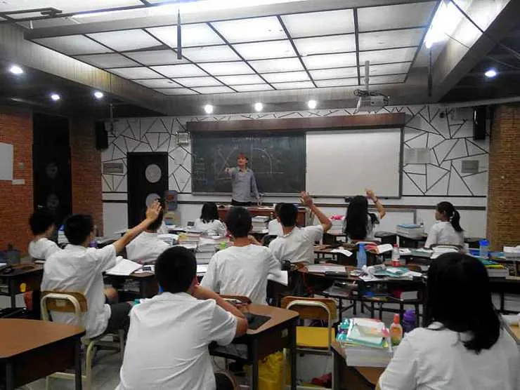 Eric in one of his many teaching jobs abroad.