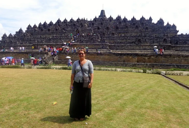 Karen in Borobudur, Indonesia, visiting the world's largest Buddhist temple in Central Java. 