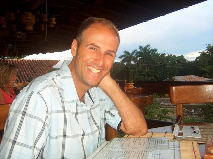 Adam about to order some delicious mofongo in Puerto Rico.