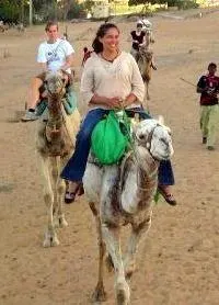 Riding a camel during Egypt travel.