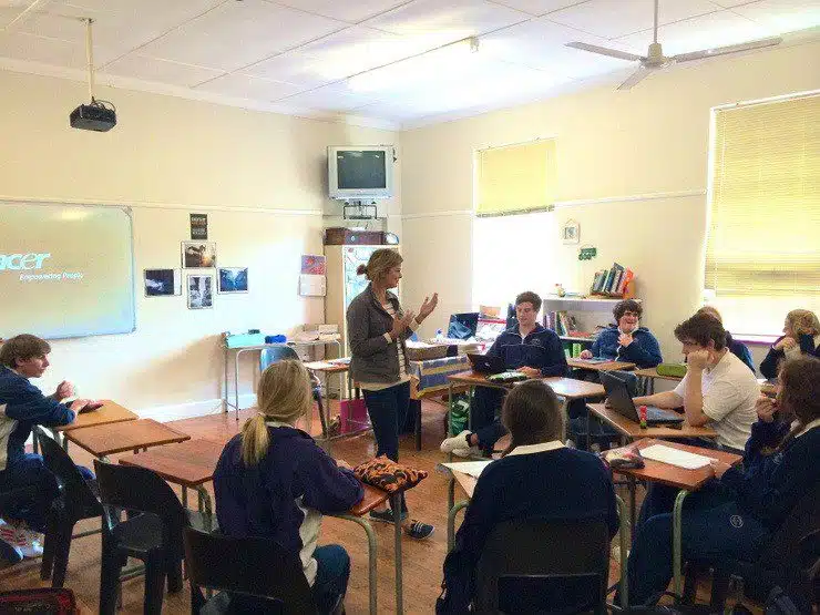 Haleigh leading her class of 11th graders through the day's lesson at Oakhill School.