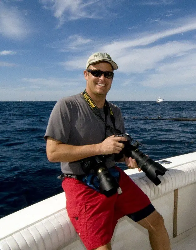 Jon with his trusty camera, ready to photograph the fish.