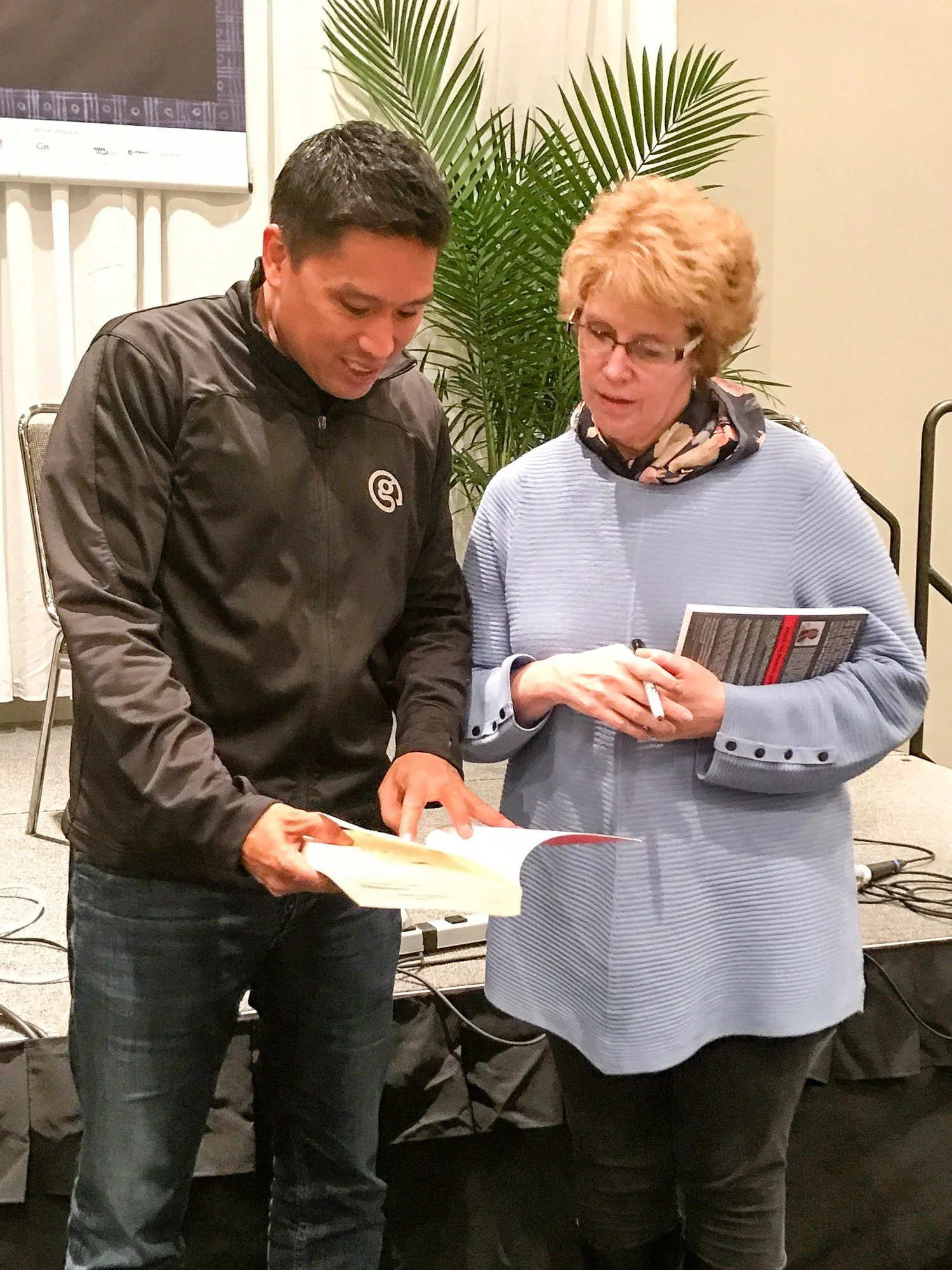 Sally meeting G Adventures founder, Bruce Poon Tip.