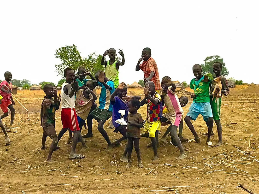Boys watching the WFSS crew in South Sudan.