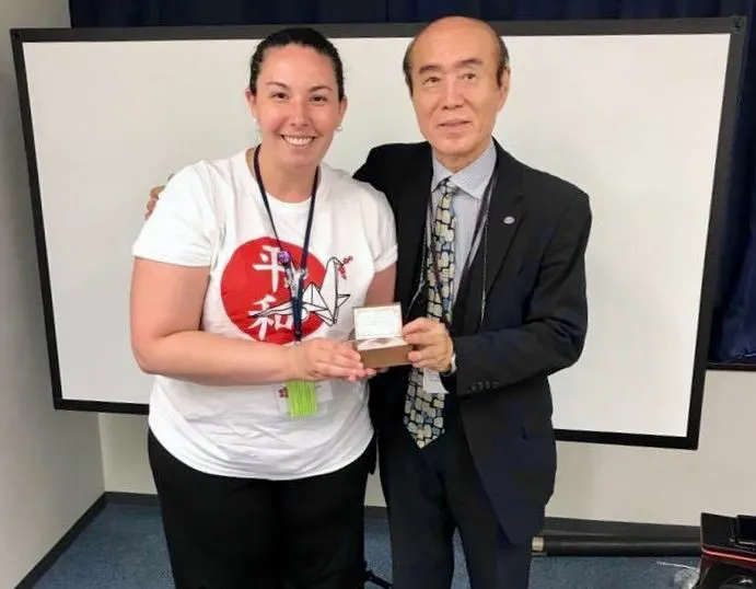 With Masahiro Sasaki, receiving his specially folded crane gift.