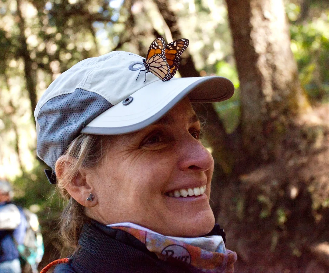 A butterfly kiss on the head.