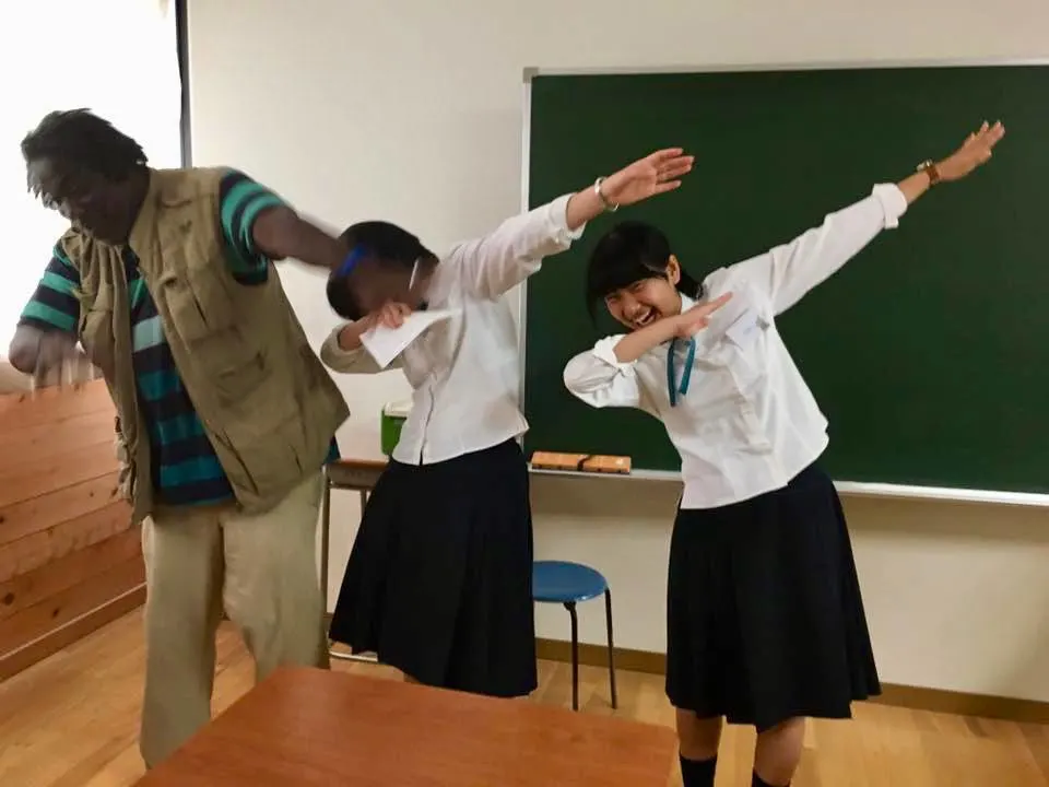 Dunn teaching Japanese students how to do the dance move, &ldquo;The Dab.&rdquo;
