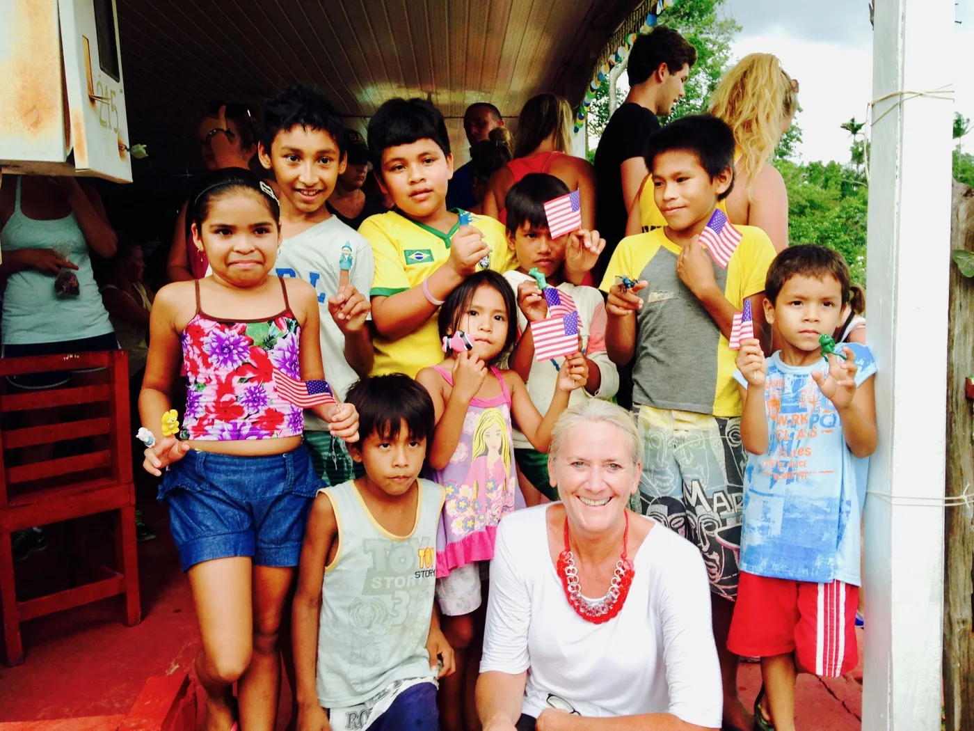 Education author and global travel expert, volunteering by the Amazon river in Brazil.