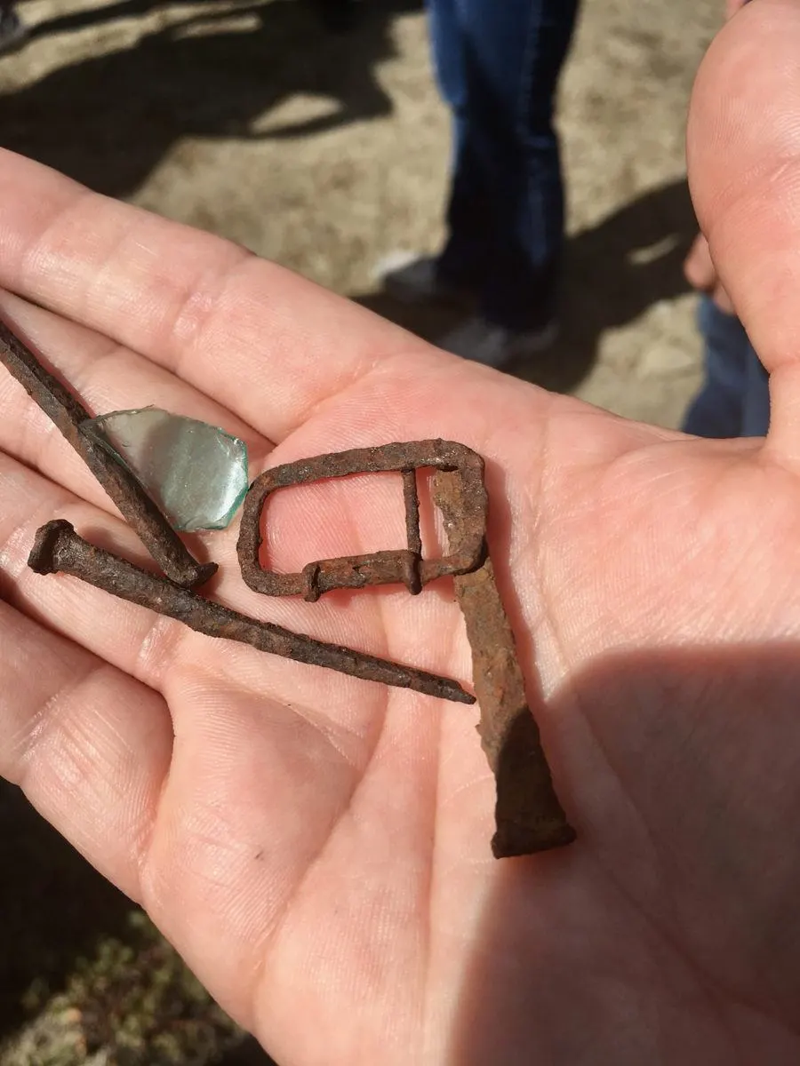 Fragments of a tea cup and nails left by Chinese workers.