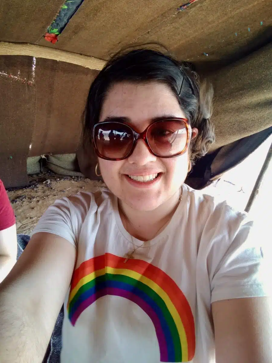 Gina sitting in a Berber tent in the Sahara desert. The Berbers are the original inhabitants of the Morocco region.
