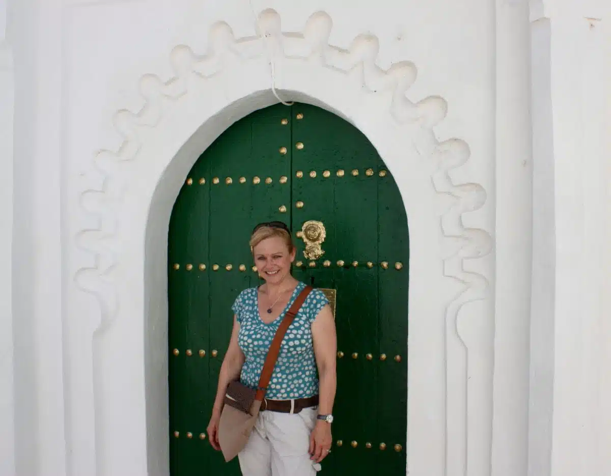 Jessica and an ornate door on her world travels.