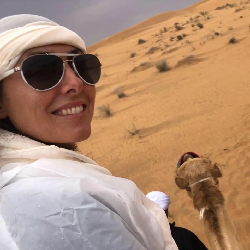 Tara in the desert in Dubai, UAE.