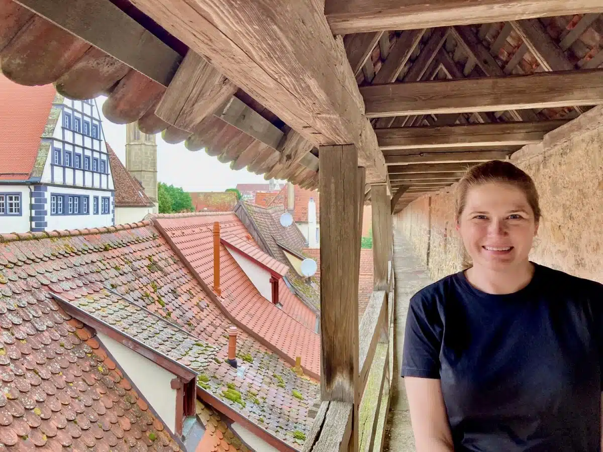 Walking the medieval walls surrounding Rothenburg ob der Tauber, Germany.
