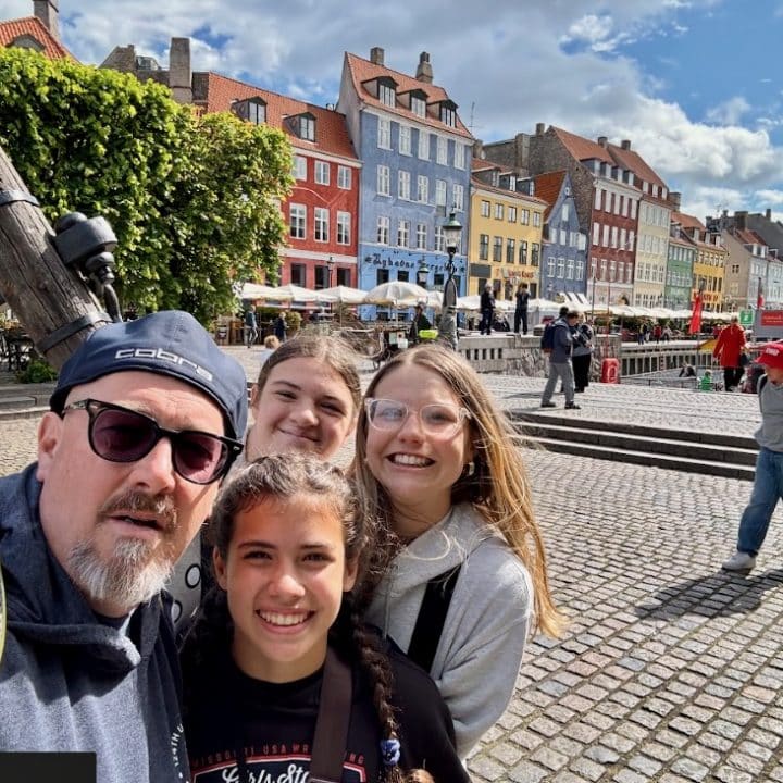 This photo has the backdrop of the iconic colorful buildings of Copenhagen which are even better seen in person.