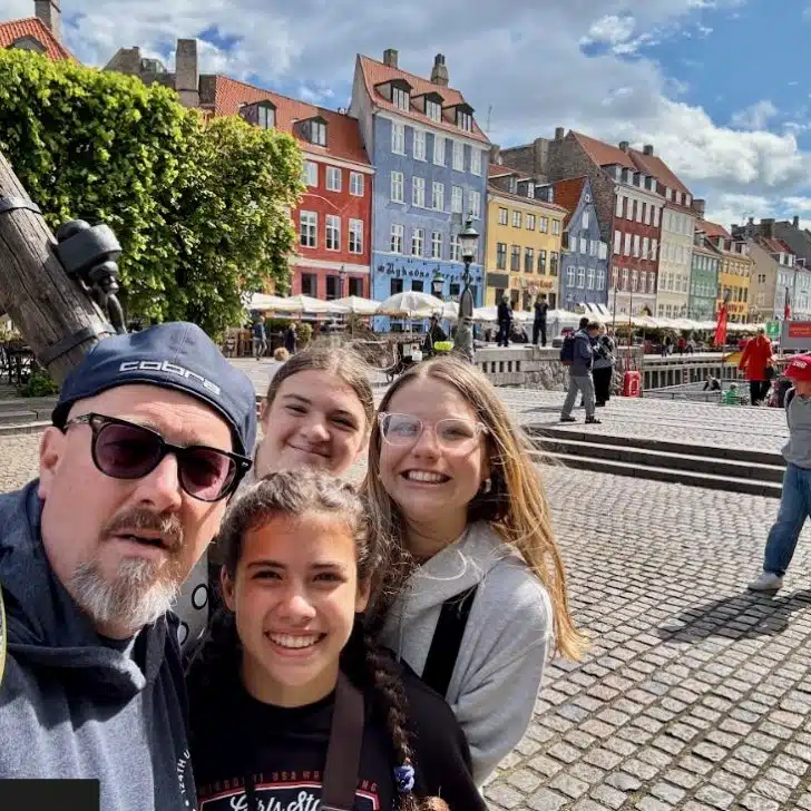 This photo has the backdrop of the iconic colorful buildings of Copenhagen which are even better seen in person.