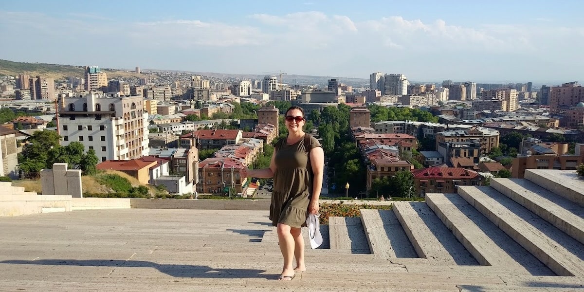 Maria on top of the Cascade Complex overlooking the city of Yerevan.