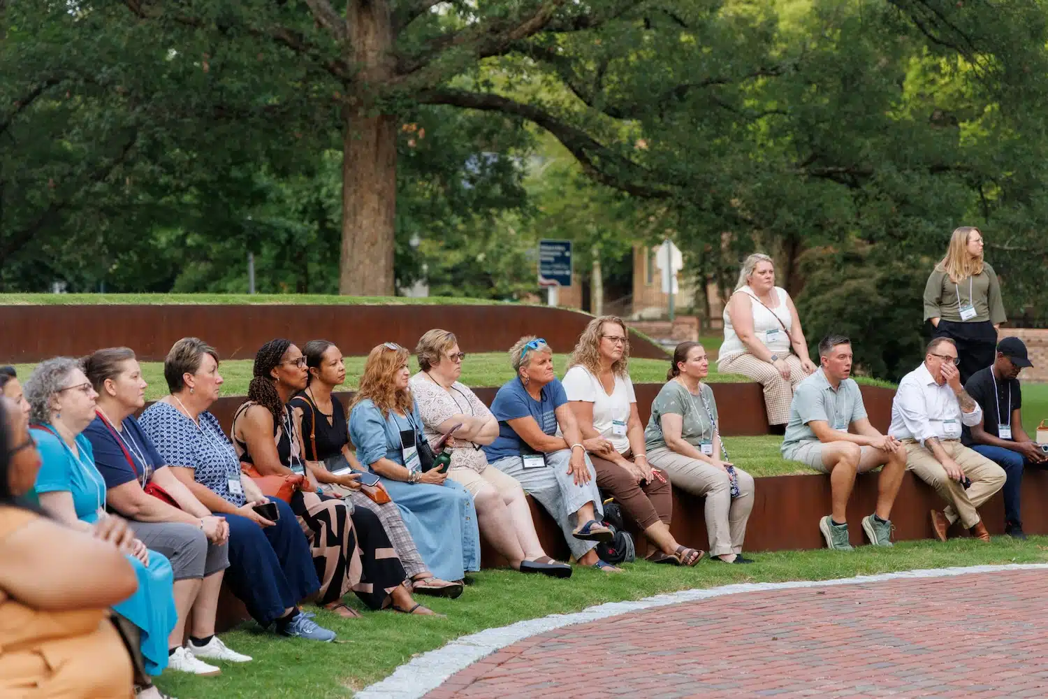 Listening to a speaker at Hearth: Memorial to the Enslaved.